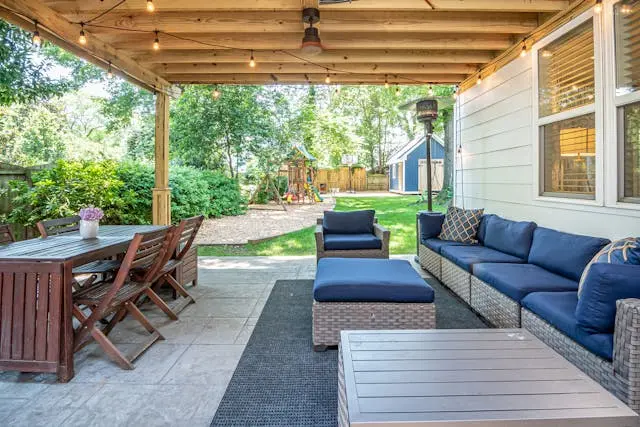 Custom pergola installation over a backyard patio in Central Texas
